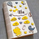 Personalizovana žuto siva kutija bebinih uspomena (Iva) sa leptirićima, balonom, hello kitty, flašicom za mleko i bebinim kolicima
